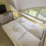 Ferienhaus Regenbogen F401 mit Kamin, Terrasse, Garten